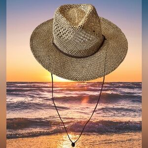 Brown straw wide brim hat with adjustable string at the back